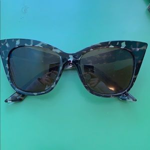 What cat eye leopard print sunglasses